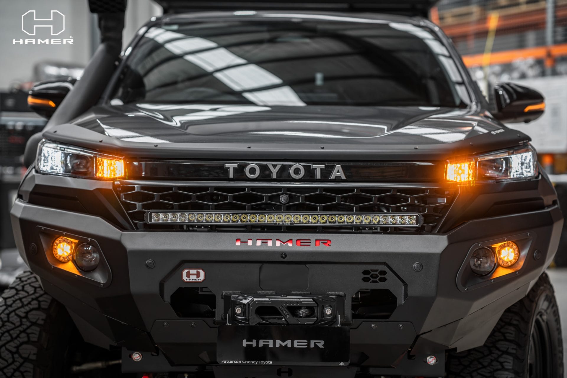 Full front view of Hamer King Series bull bar on Toyota Hilux N90 2026 with LED lighting and integrated design